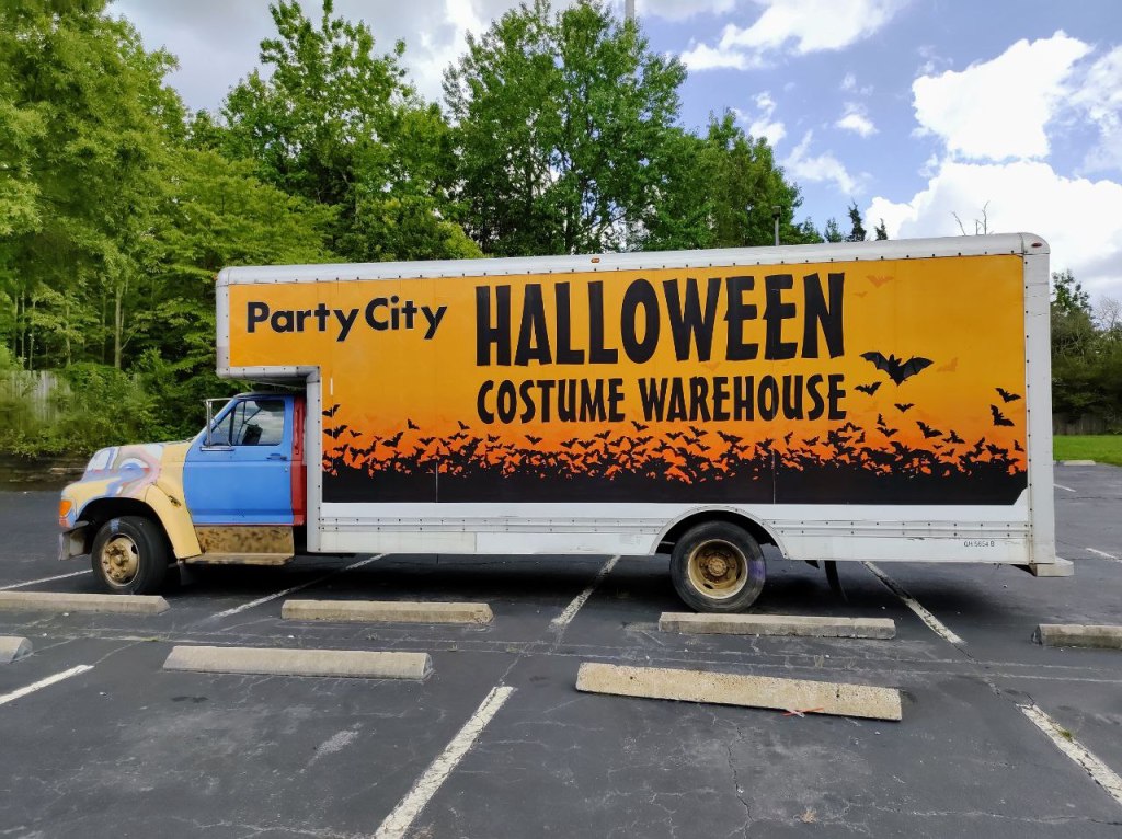 old party city truck with halloween motif