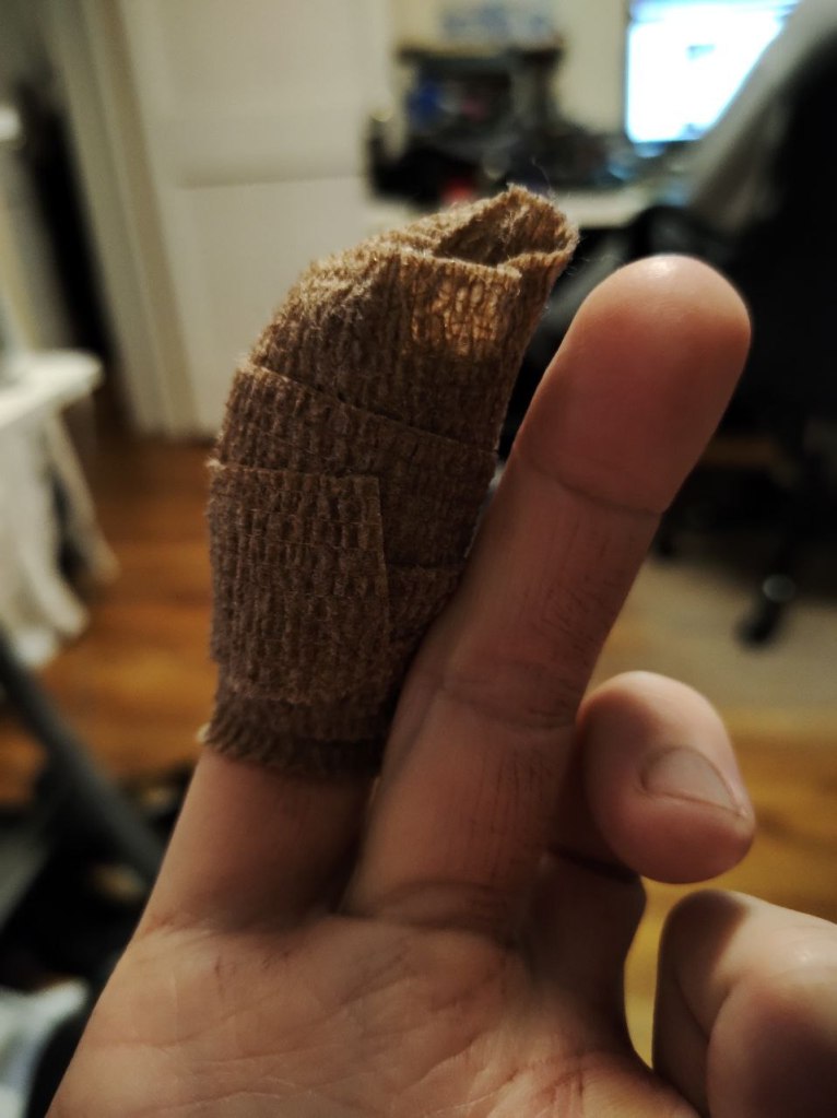my hand with bandaged index finger